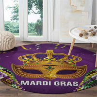 Purple round Mardi Gras carpet with gold crown mask, green accents, 'MARDI GRAS' text