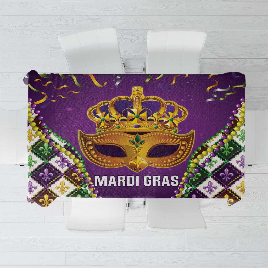 Purple Mardi Gras style tablecloth with gold fleur-de-lis crown and bead details
