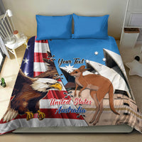 Personalized bedding set with eagle, kangaroo, and star graphics on blue-and-white duvet