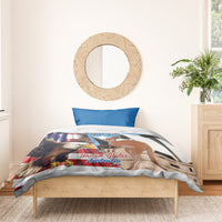Blue-and-white bedding set with eagle and kangaroo scene and personalized text on duvet