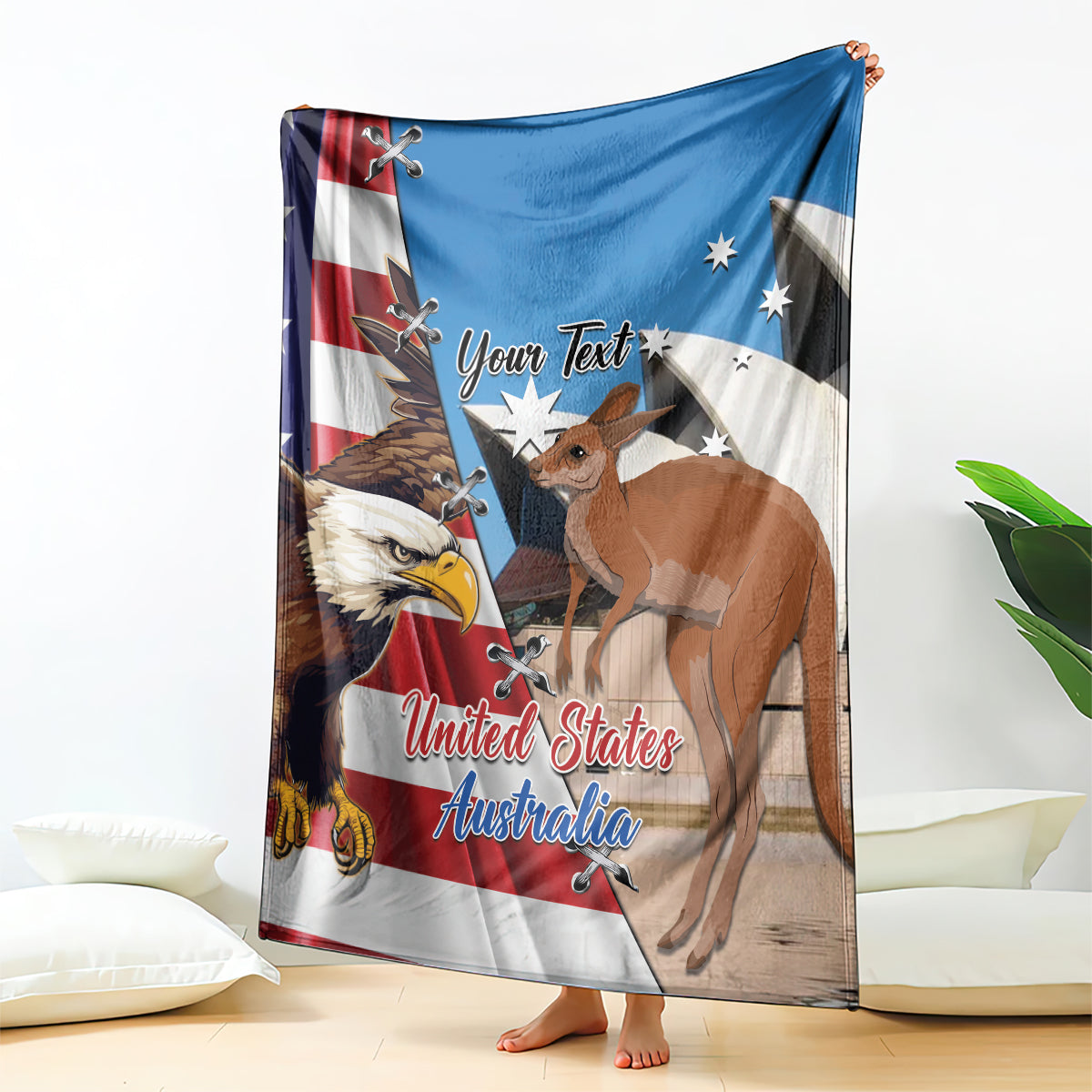 Personalized blue fleece blanket held up, eagle and kangaroo US-Australia design
