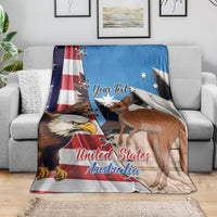 Personalized blue blanket on sofa with eagle and kangaroo over US-Australia flags