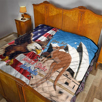 Personalized quilt on bed, blue and white flags with eagle and kangaroo graphic