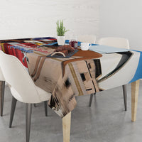 Blue tablecloth on dining table with eagle, kangaroo, and flag-style artwork