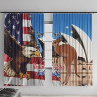 Blue window curtain pair with eagle and kangaroo prints, long panels on curtain rod.