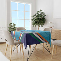 Blue sports tablecloth with trophy graphic and multicolor stripe border on table