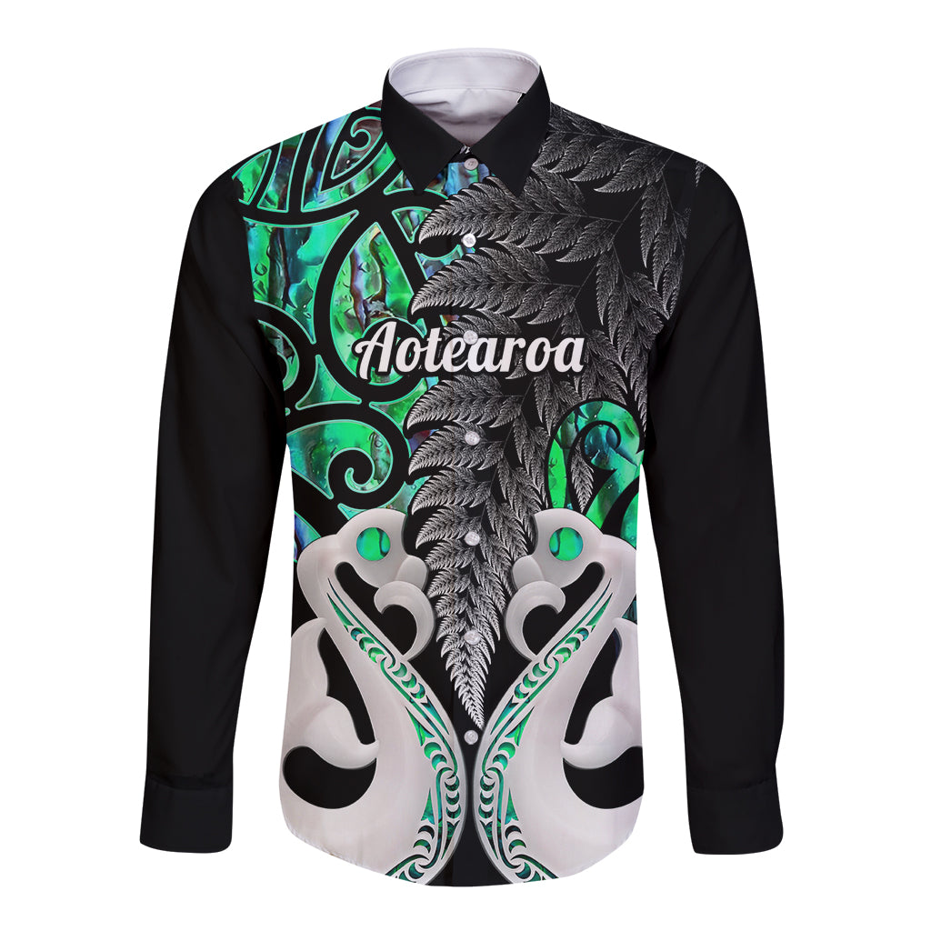 Long-sleeve button shirt with black sleeves and green Maori-style front artwork