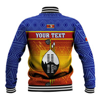 Blue baseball jacket with geometric pattern, YOUR TEXT back panel, and black emblem