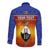 Blue long-sleeve button shirt back view with shield African pattern and 'YOUR TEXT' banner