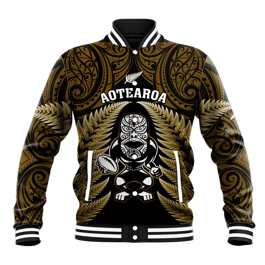 Gold baseball jacket with Maori tiki front graphic, gold-and-black leaf sleeves