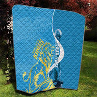 Blue quilt blanket featuring Saint Lucia Kings gold lion and oval logo on quilted fabric