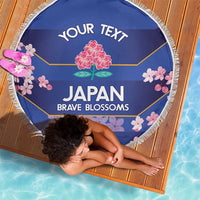 Blue round beach blanket with white fringe, Japan Brave Blossoms floral design and 'YOUR TEXT'