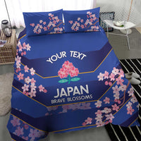 Blue duvet and two pillowcases bedding set with pink cherry blossom and yellow border