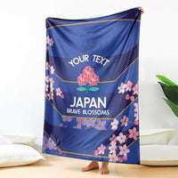 Blue rugby blanket draped on floor with cherry blossoms and 'YOUR TEXT' graphic