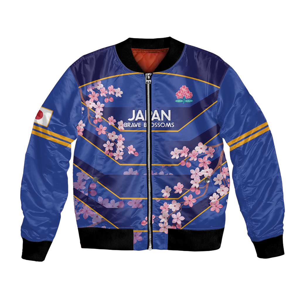 Blue bomber jacket with cherry blossom graphic, front zipper, ribbed black collar and cuffs