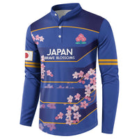 Blue long-sleeve rugby button sweatshirt with cherry blossom print and yellow trim