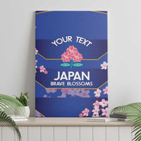 Blue canvas wall art with pink flowers, 'YOUR TEXT' and 'JAPAN BRAVE BLOSSOMS'.