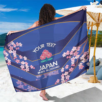 Blue Japan rugby sarong with cherry blossom print, 'YOUR TEXT' and 'JAPAN BRAVE BLOSSOMS'