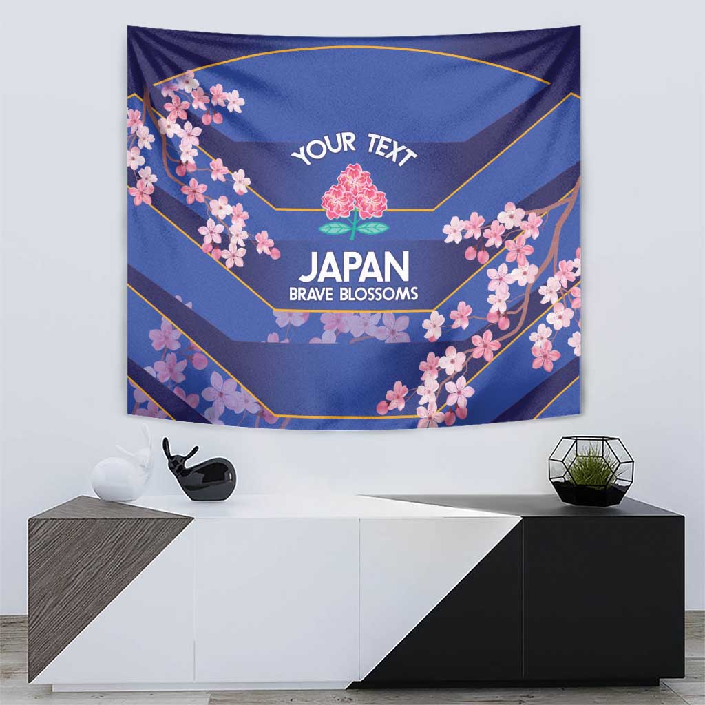 Blue hanging tapestry with pink blossom branches, gold accents, “YOUR TEXT” and Japan Brave Blossoms