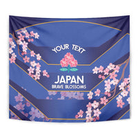 Blue rectangular tapestry with pink cherry blossoms, gold lines, and “YOUR TEXT” Japan Brave Blossoms