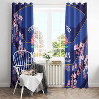 Blue window curtain with pink cherry blossom clusters and Japan Brave Blossoms text