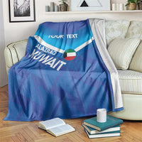 Blue custom football blanket with 'YOUR TEXT' and Alazraq KUNWAIT design, draped over sofa