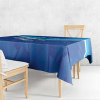 Blue football tablecloth draped on rectangular table with white edge stripe and geometric print