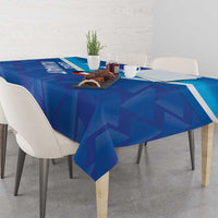 Blue football tablecloth on dining table with geometric pattern and white edge stripe