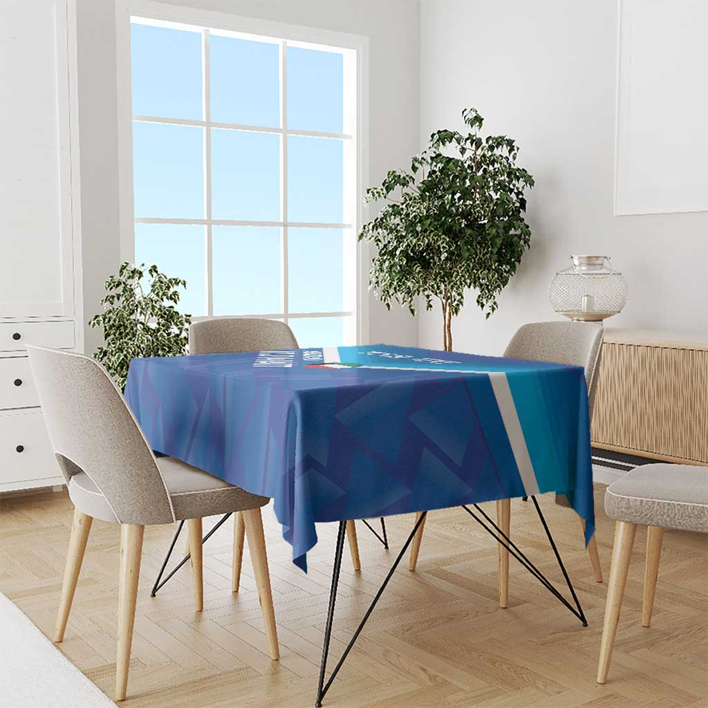 Blue football tablecloth on dining table with white edge stripe and geometric shapes
