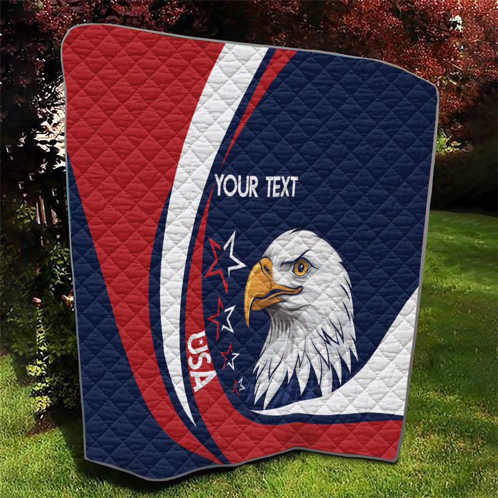 Rugby quilt blanket with red, navy, and white colors, quilted texture, eagle face, text