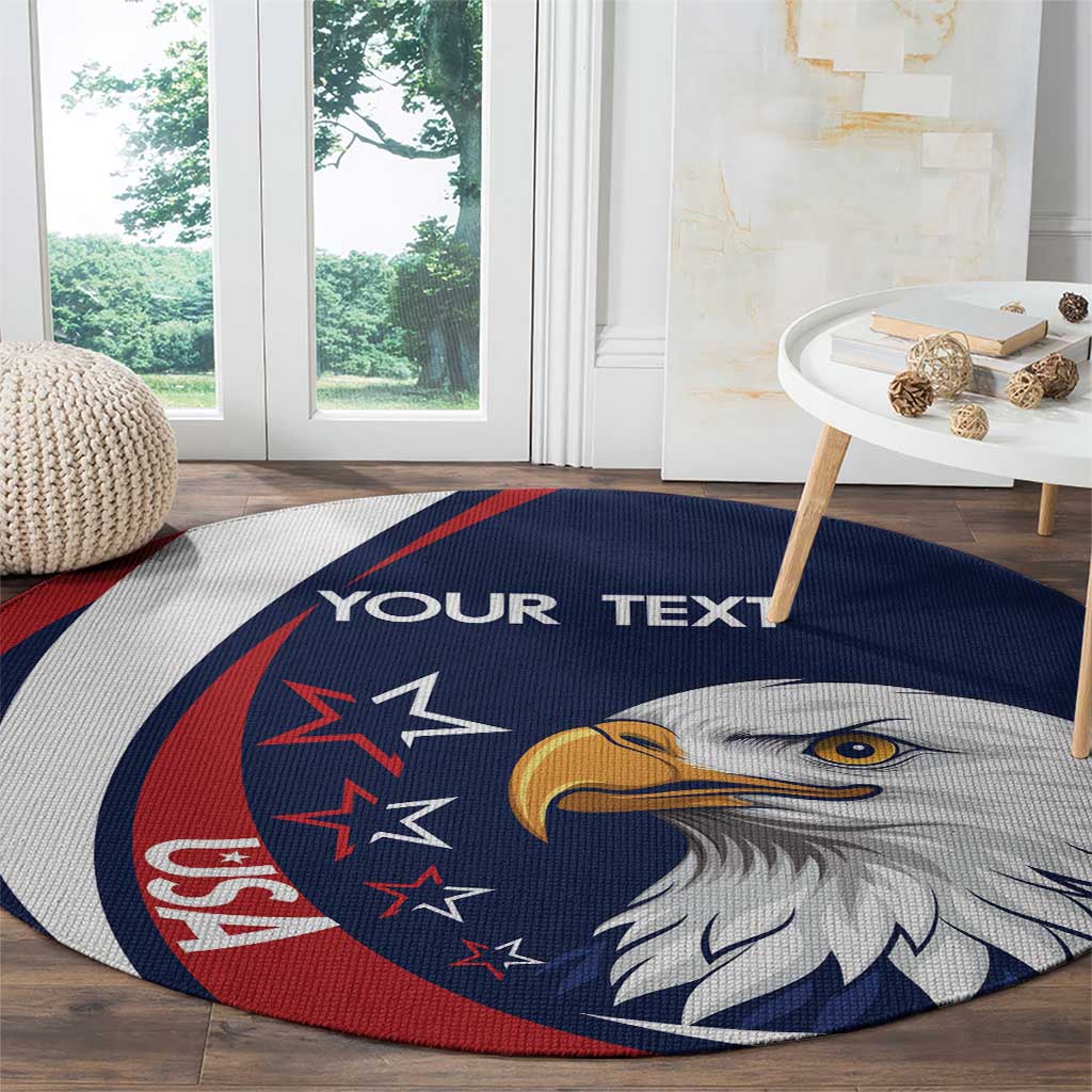 Round eagle-themed rug in blue with star accents and 'YOUR TEXT' across the center.