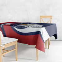 Blue, red and white eagle tablecloth with bold diagonal stripes on a bench table