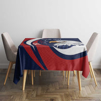 Rectangular eagle sports tablecloth in blue, red, and white on a dining table