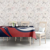 Eagle sports tablecloth in blue, red, and white on a dining table with chairs