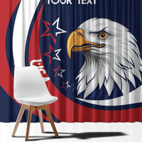 Close view of window curtain with white eagle head on navy and red/white stripes