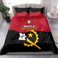 Angola bedding set with two red patterned pillow covers and matching red top, black star graphic