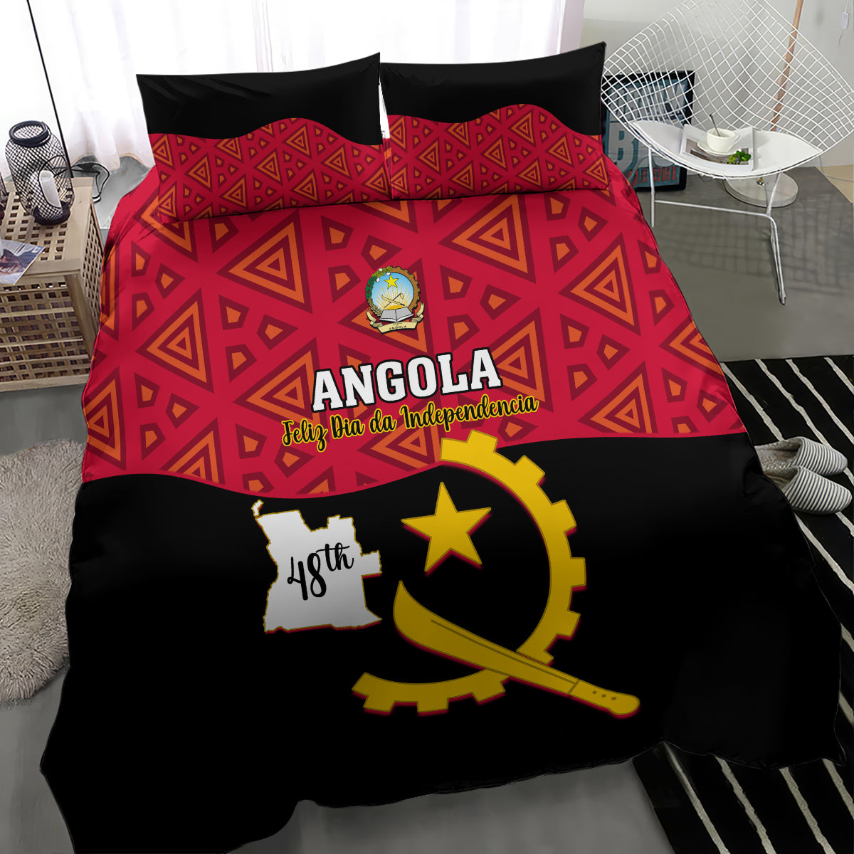 Angola bedding set with red geometric center panel, ANGOLA text and black gun-star emblem