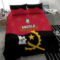 Angola bedding set with red geometric center panel, ANGOLA text and black gun-star emblem