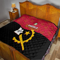 Angola quilt on bed, red top panel and black quilted panel with yellow emblem artwork