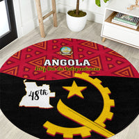 Red and black round Angola independence rug with crest, yellow star, and 48th text