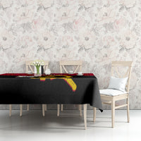Angola Independence Day tablecloth with black base and red top stripe on dining table