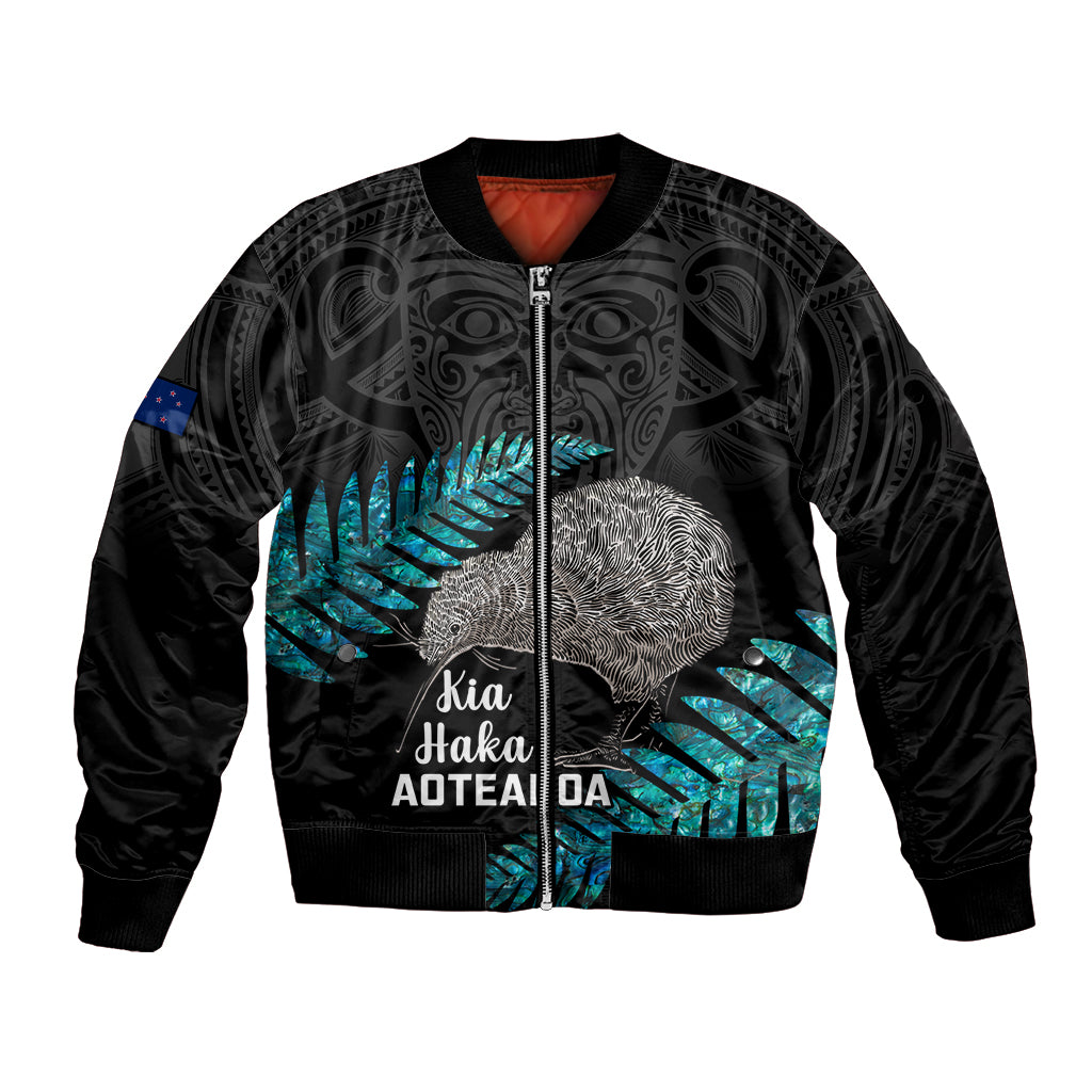 Unisex black zip-front bomber jacket with blue silver fern graphic and 'Kia Haka' text