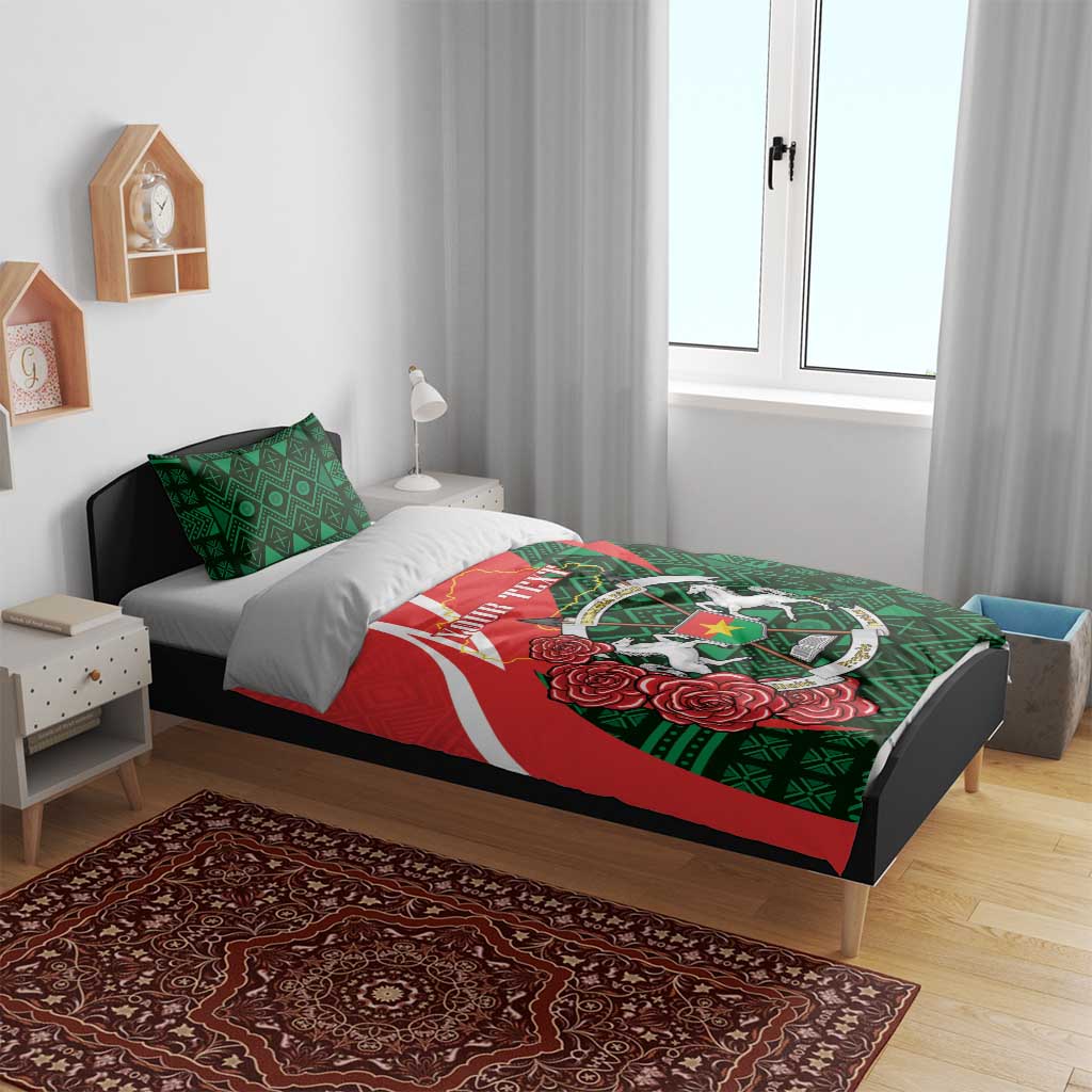 Personalized bedding set on bed: red and green duvet cover with emblem and roses