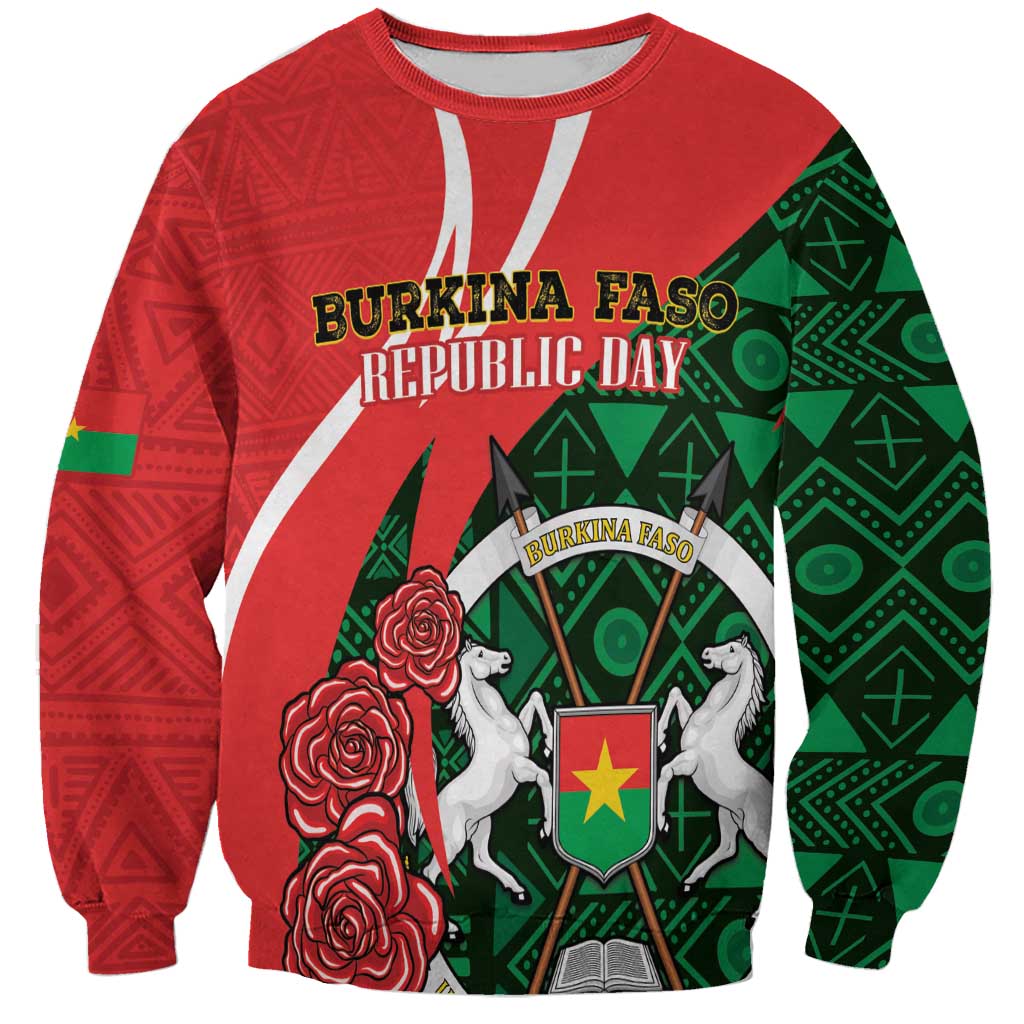 Red unisex sweatshirt with green pattern and central crest with horses and roses