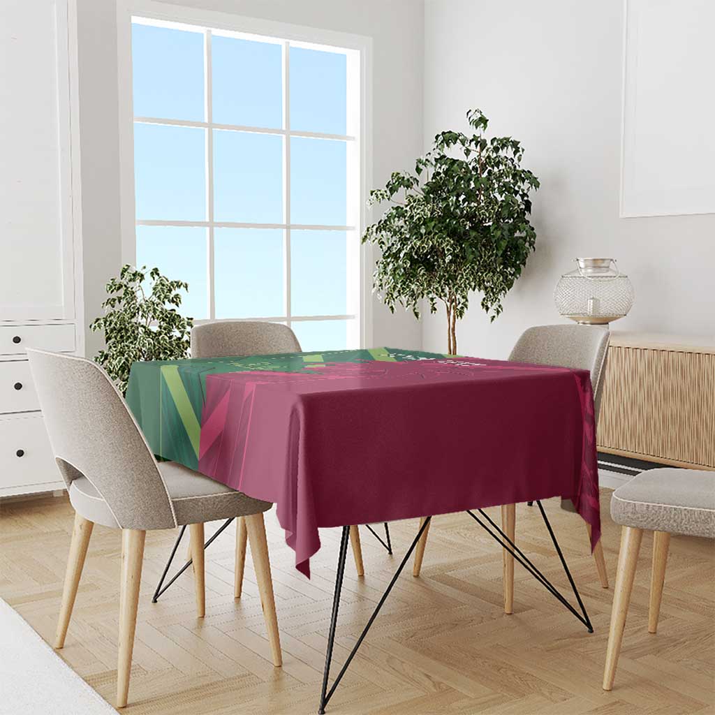 Rectangular tablecloth draped on dining table in green and magenta panels