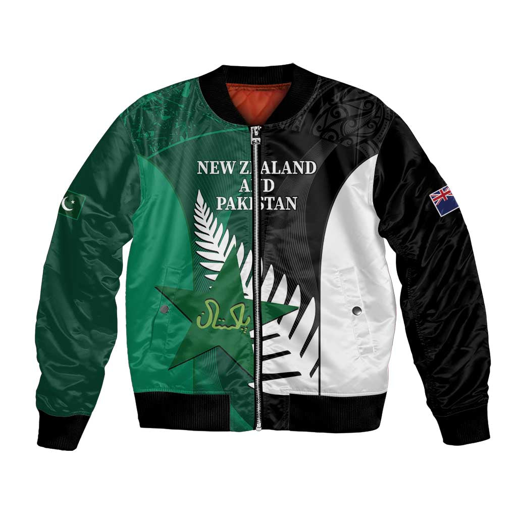 Black bomber jacket with green and white panels, NZ and Pakistan graphic, zip front