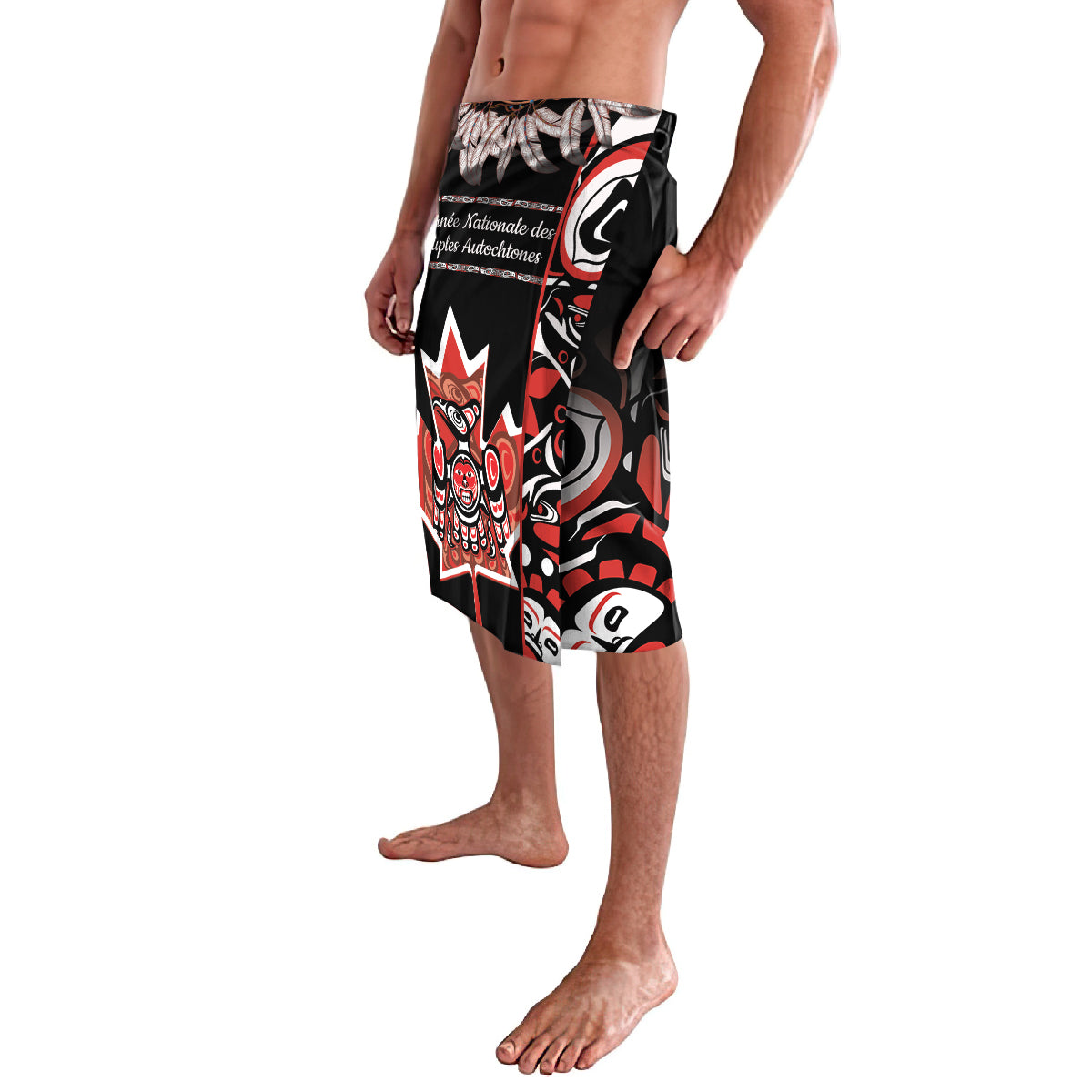 Black graphic board shorts with red/white indigenous-style artwork, elastic waist