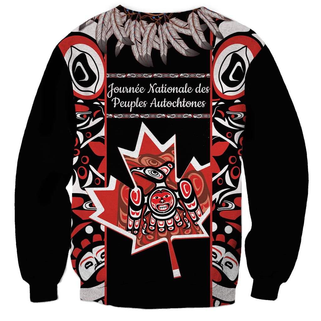 Unisex black sweatshirt with red and white Indigenous day graphic and French text