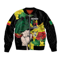 Black bomber jacket with front zipper; colorful Benin 64th anniversary graphic artwork