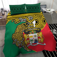 Green red yellow duvet with leopard coat of arms design and geometric trim